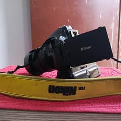 Nikon D5200 with {18-105} Lens