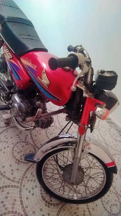 Honda cd 70 2008 model 9 ka nember laga huwa hai,,03085099436