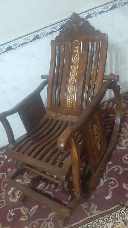 swing chair in shishum wood 0