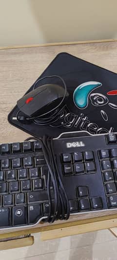 mouse, keyboard and mouse pad