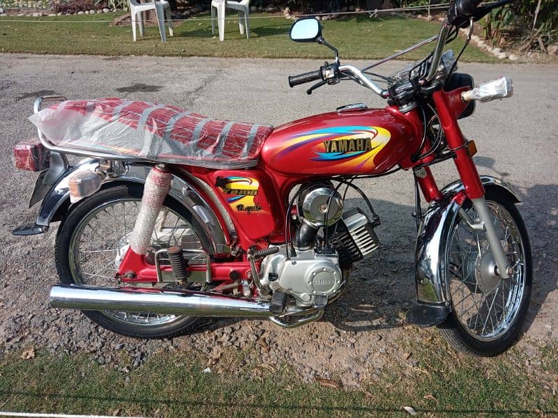 Yamaha 100cc 2 stroke bike for sale total original location Lahore DHA 18