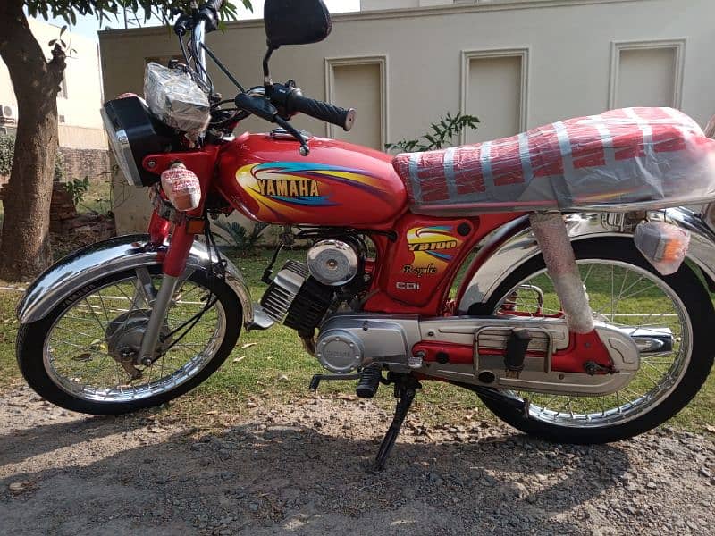 Yamaha 100cc 2 stroke bike for sale total original location Lahore DHA 19