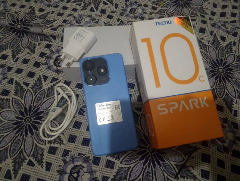 tenco spark 10c(8/128)box & charger are available with warranty 0