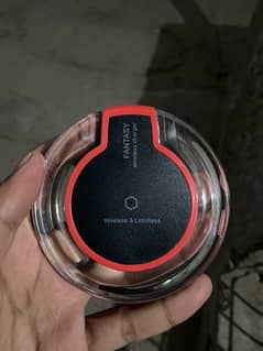 Apple wireless charger branded with cable