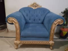 Sofa colour is blue and colour gold