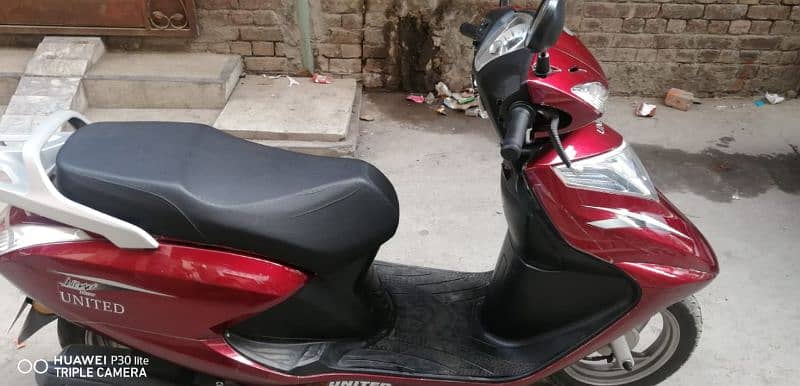 united 100cc petrol scooty 2021 0