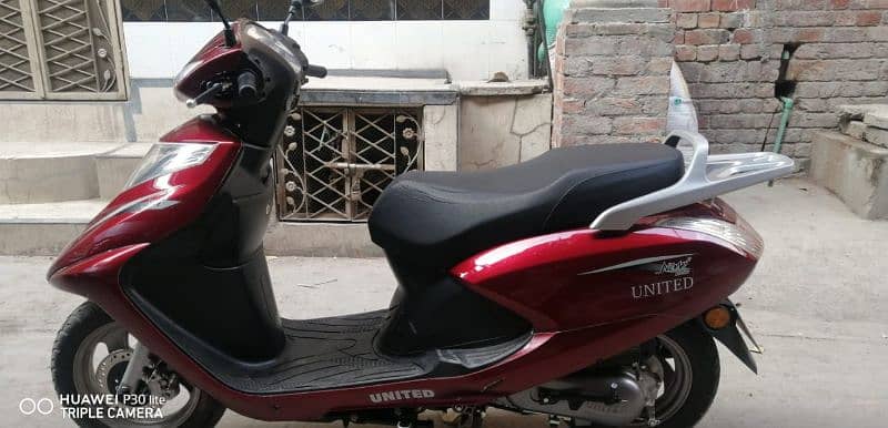 united 100cc petrol scooty 2021 2