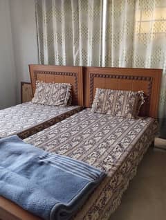 Two single Beds with mattress for sale