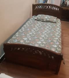 Single wooden bed