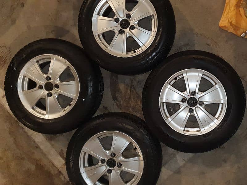 rim 14inch 6j, tyre 185.65. 14 ,brand new condition rim and 75%+ tyres 4