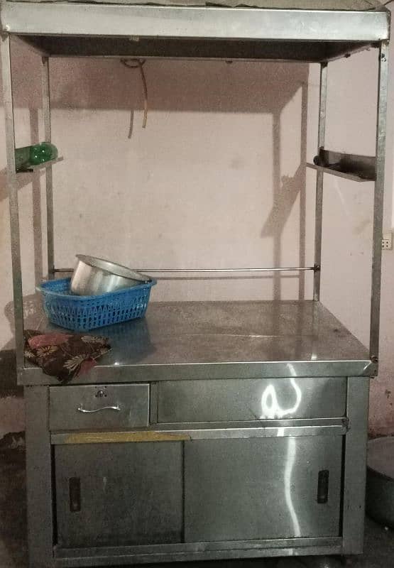 STAINLESS STEEL COUNTER IN VERY EXCELLENT CONDITION . 0