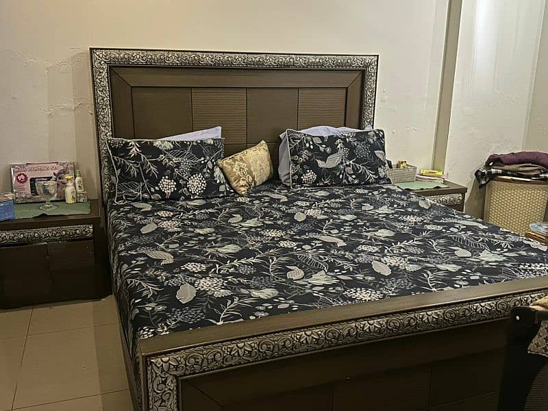 bed with side tables and dressing 0