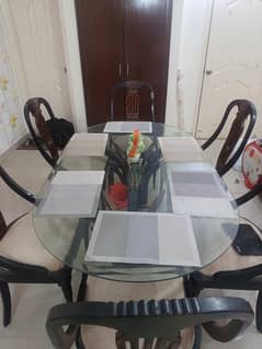 Glass table with 6 chairs