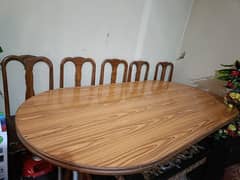 used like new dinning with chairs