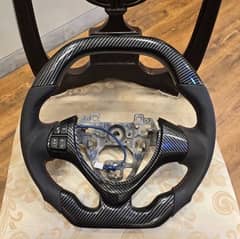 suzuki alto carbon fibre steering