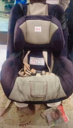 ALMOST NEW CARRY COT +  IMPORTED CAR SEAT AND BABY CHAIR