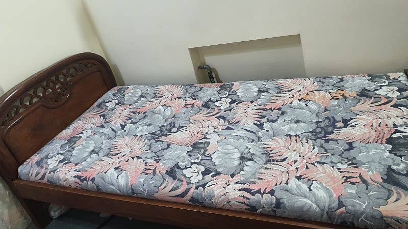 Wooden single Bed for details contact on 0310-8619965 0