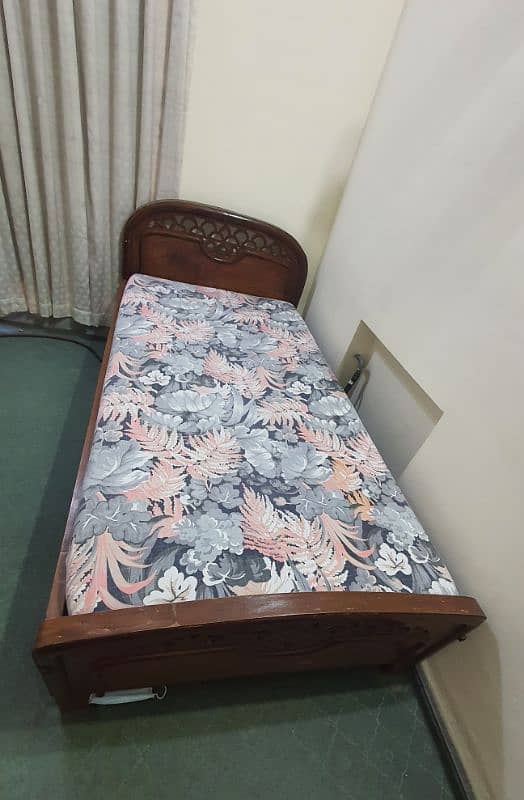 Wooden single Bed for details contact on 0310-8619965 6