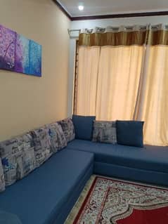 L shaped Blue sofa