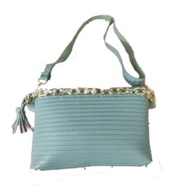 ladies handbag with adjustable size