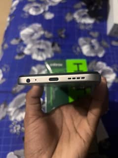 Infinix hot 50i 6/128 with box charger condition 10/10