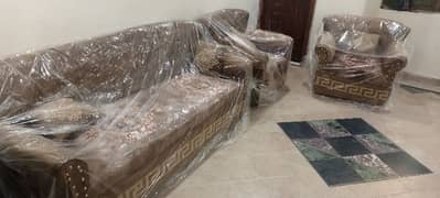 Shifting Abroad selling 5 seater new sofa in imported dust proof