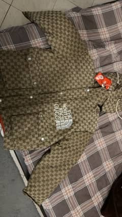 north face x Gucci jacket