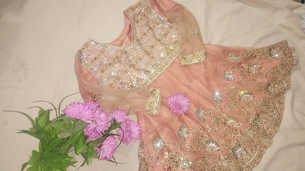 The Allure of Peach:  Beautiful Peach Colour Lehenga Dress 4