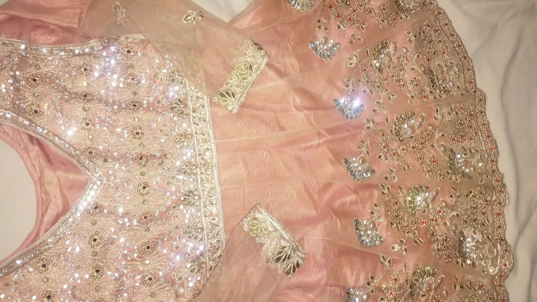 The Allure of Peach:  Beautiful Peach Colour Lehenga Dress 5