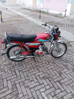 Bike Honda 70cc Red colour for sell.