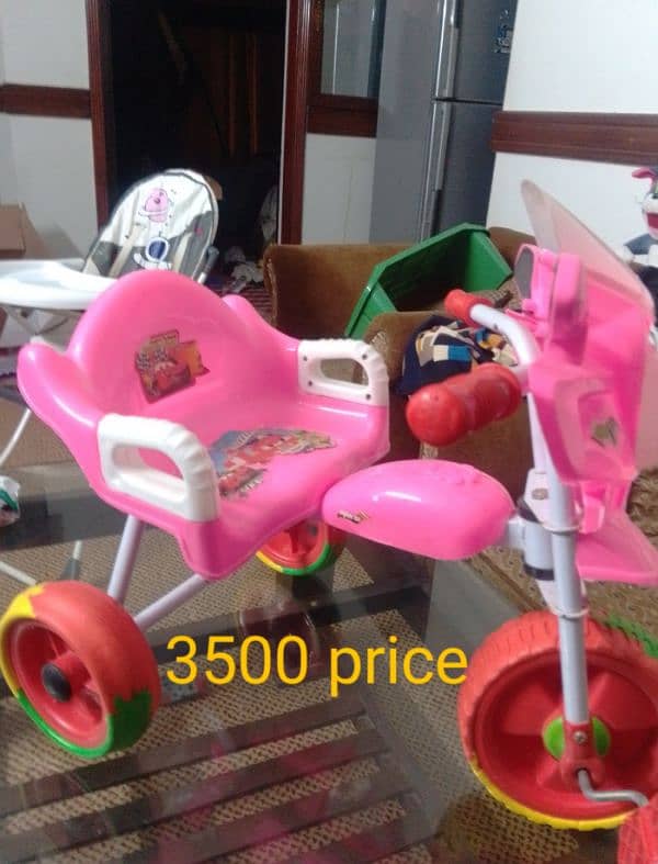 19000 mai all items,woker,sycle,high chair, baby carrier 2