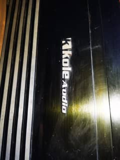 Kole Audio branded amp already setup on tractor with deck