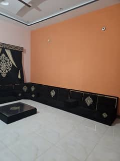 Black Majlis with table and curtains