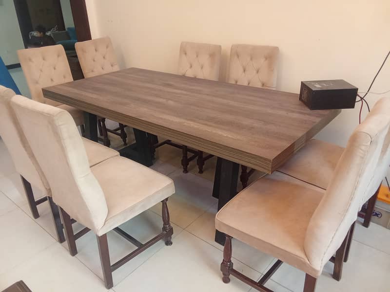 Wooden branded 8 seater dining table (workman) and 8 chairs 0