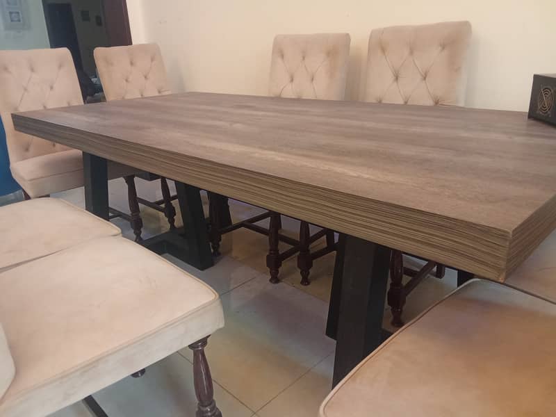 Wooden branded 8 seater dining table (workman) and 8 chairs 8