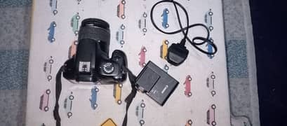 Canon EOS 4000D with 18/55mm Auto Lens