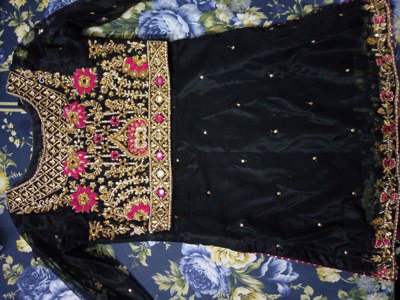 its a shirt with full of Karai work flapper and dupatta 2