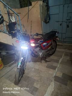 my 125 motorcycle for sale looking new my name Karachi number