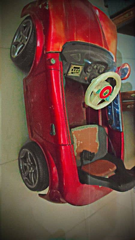 Red colour kids car used selling at best price 0