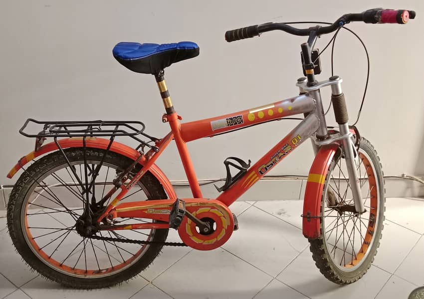 Bicycle in orange color | Stylish and Durable Bike for All Ages" 1