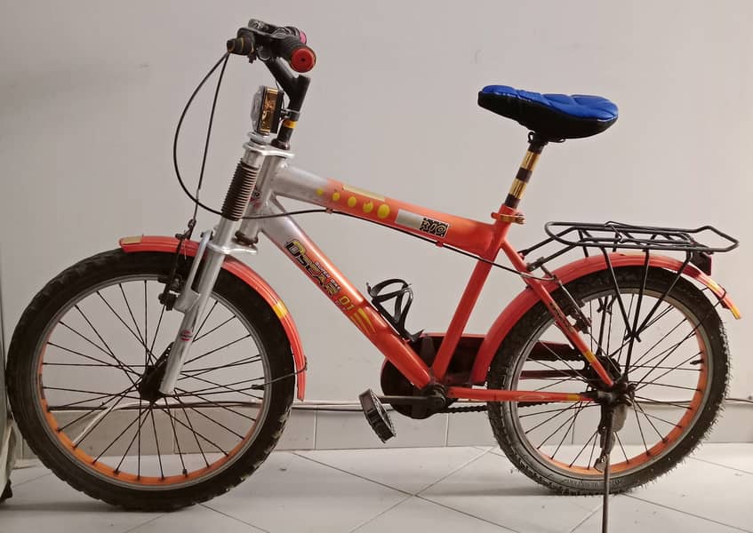 Bicycle in orange color | Stylish and Durable Bike for All Ages" 3