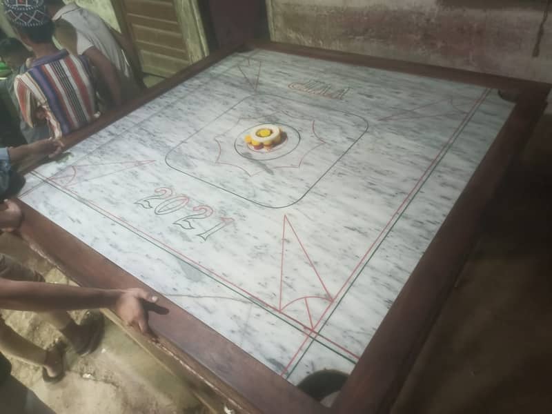 Carrom Board Marbal Large Size for sell regarded by Mr. Rafay contact 0