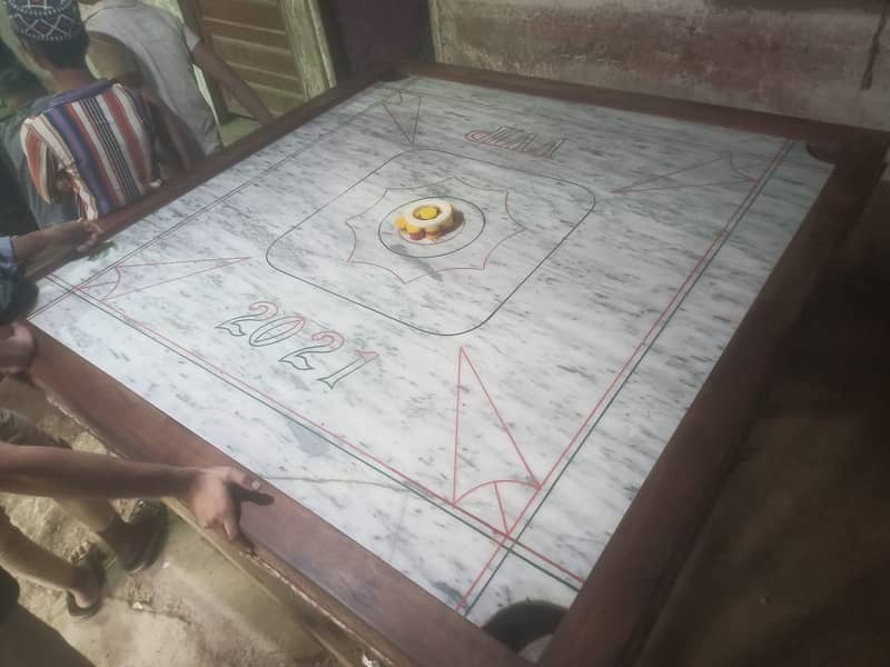 Carrom Board Marbal Large Size for sell regarded by Mr. Rafay contact 3