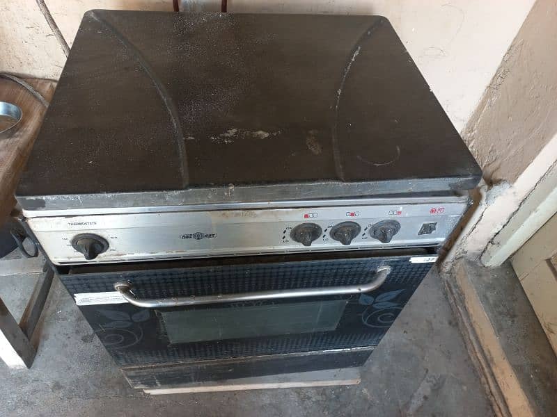 nas gas coking range , gas oven, backing options , price 50% of new 4