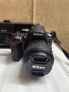 Nikon D5300 along with zoom lense