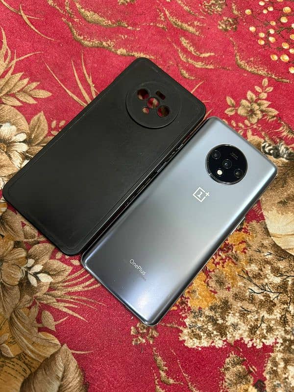 one plus 7t 8/128 dual sim waterpacked for sale read add plz 12