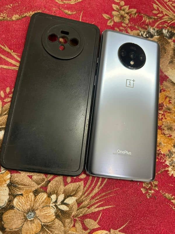 one plus 7t 8/128 dual sim waterpacked for sale read add plz 13