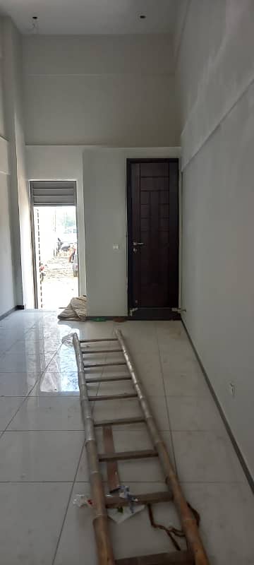 Centrally Located Shop In DHA Phase 7 Is Available For sale 0