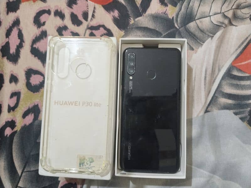 selling my Huawei p30 lite 4gb ram 128 battery replaced 9