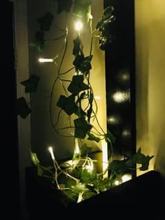 hanging showpiece with leaves and fairy light